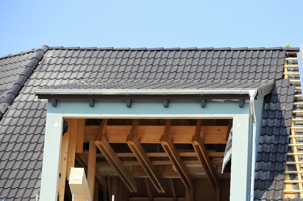 Dachaufstockung an einem Wohnhaus